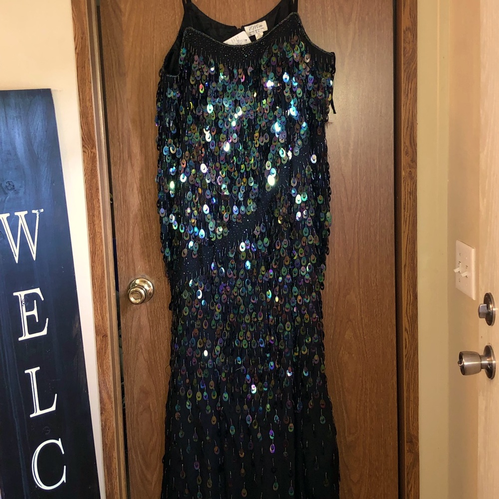 Worn once and it is too pretty of a dress to just sit in my closet